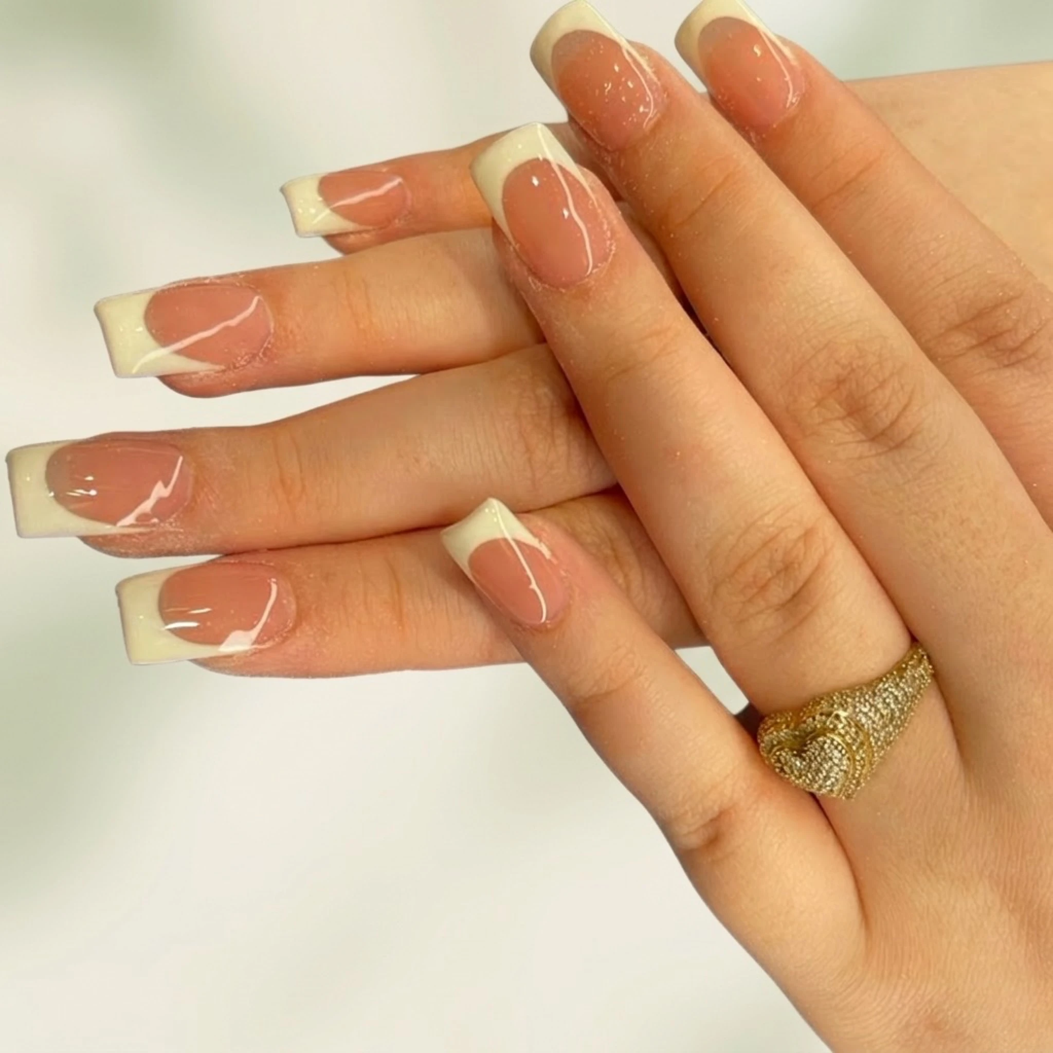 Classic French tip manicure — elegant white tips on natural nails at Salt & Polish